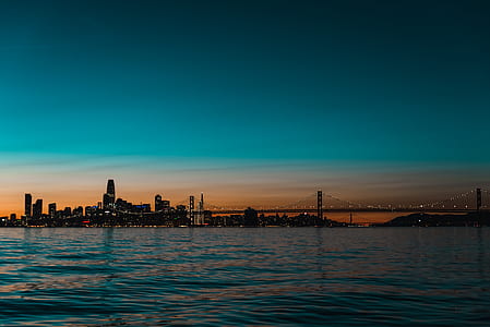 blue sea and bridge at night thumbnail