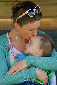 woman kissing baby thumbnail