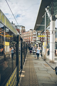 train beside street during daytime thumbnail