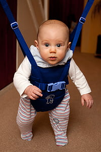 baby wearing gray and red pants with carrier thumbnail