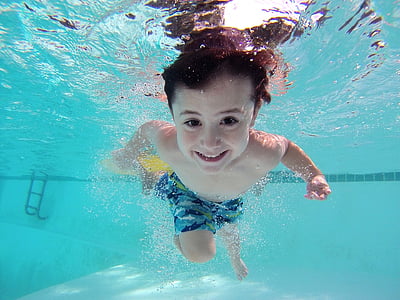 boy swimming on swimming pool thumbnail
