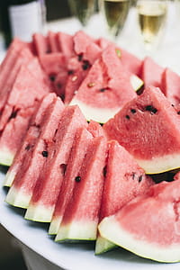 Close-Up Photography of Sliced Watermelons thumbnail