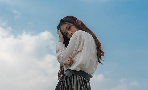 woman wearing white long-sleeved shirt thumbnail