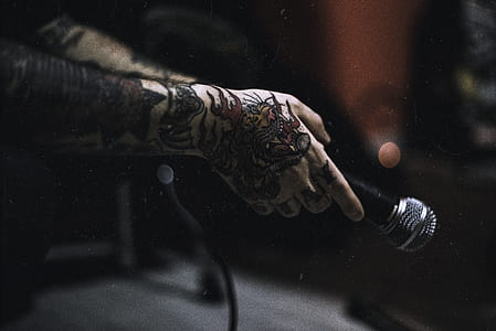 person holding microphone thumbnail