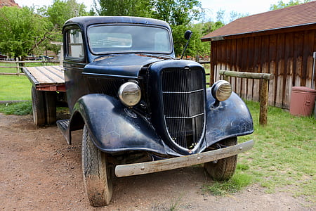 vintage black car during daytime thumbnail