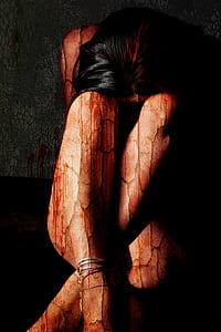 woman sitting on ground painting thumbnail