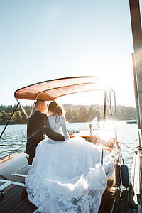 Man Hugging Woman on Yacht thumbnail