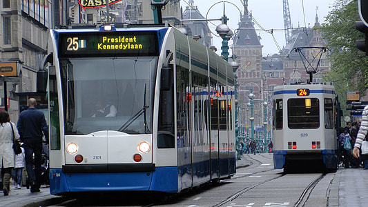 Tram on Damrak in Amsterdam, Netherlands thumbnail