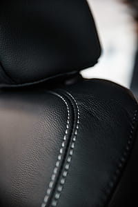 Macro Photography of Black Leather Seat thumbnail