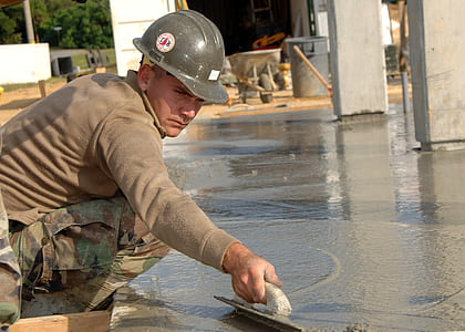 man wearing gray hard top working thumbnail