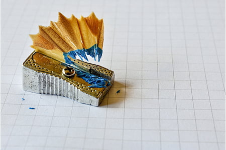 selective focus photo of silver pencil sharpener thumbnail