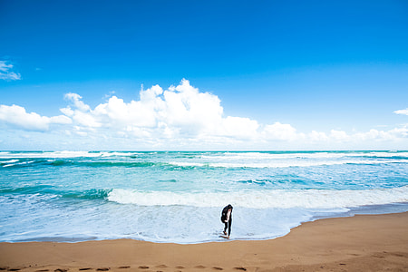 person standing on a seashore thumbnail