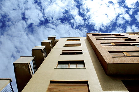 low-angle photography of brown concrete building thumbnail