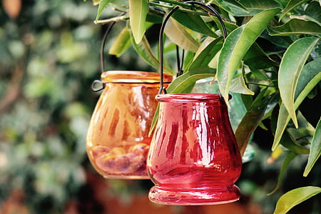 two red and orange translucent glass fruit containers thumbnail