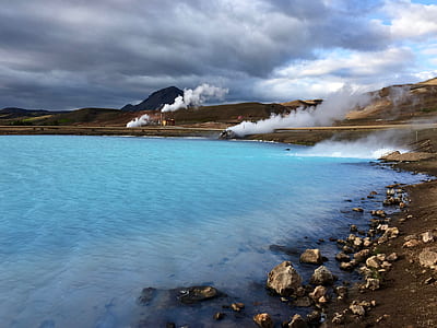 body of water near moutain thumbnail