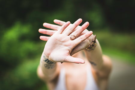 person showing left and right hand thumbnail