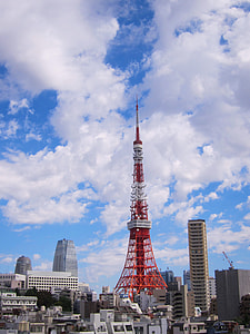 red and white tower under blue sky thumbnail