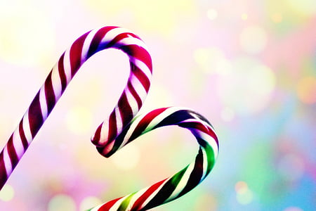 two candy canes forming heart bokeh photography thumbnail