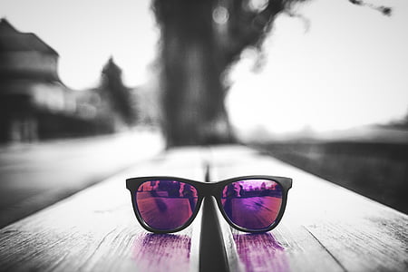selective color photography of purple wayfarer-style sunglasses thumbnail