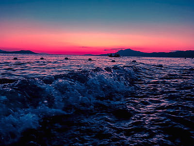 Person Taking Photo of Body of Water in Long Exposure Shot thumbnail