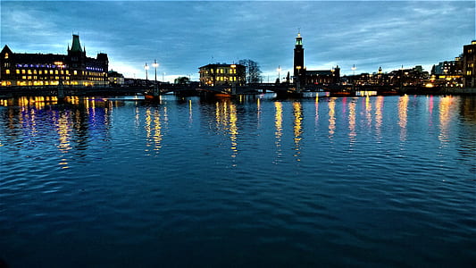 buildings near body of water painting thumbnail