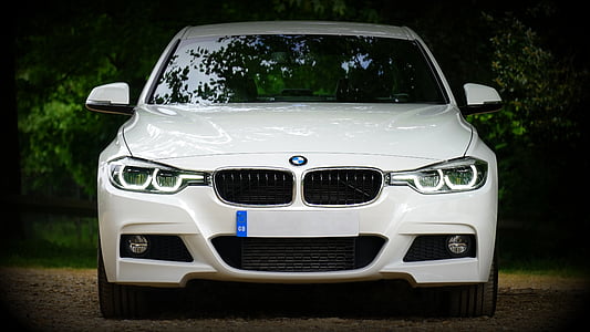 closeup photo of white BMW car thumbnail