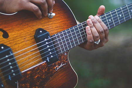 Person Playing Guitar thumbnail