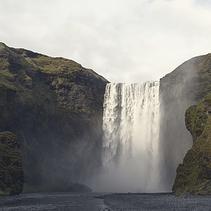 landscape photography of waterfalls during daytime thumbnail