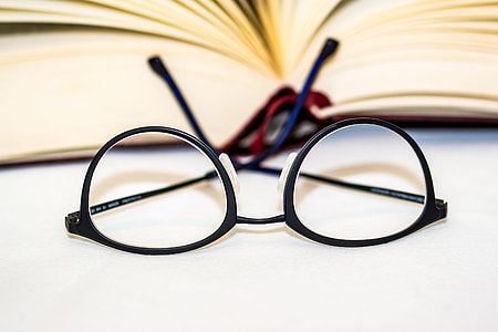 Reading glasses and book thumbnail
