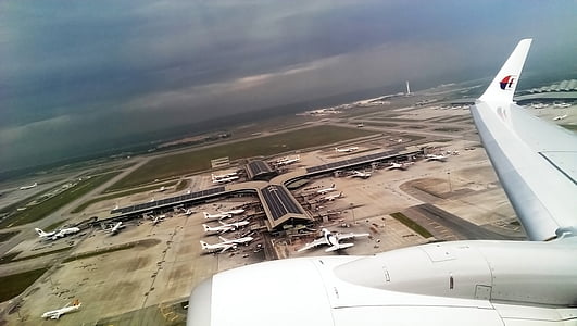 white commercial plane is about to take-off thumbnail
