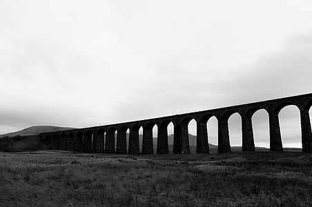 grayscale photography of concrete bridge thumbnail