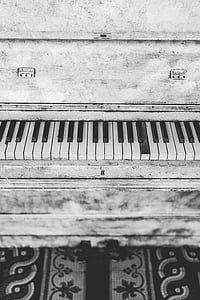 grayscale photo of upright piano thumbnail