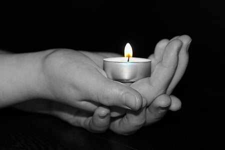 person holding tealight candle holder thumbnail
