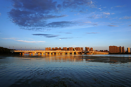 Skyline of Wuxi across the lake in Jiangsu, China thumbnail
