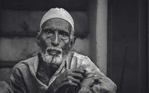 grayscale photo of man wearing thobe dress thumbnail