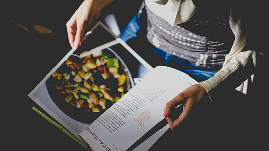 person reading cookbook thumbnail