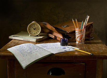 white notebook on a top of table thumbnail