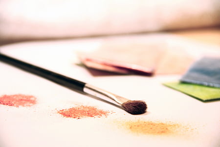 black handled makeup brush on white paper thumbnail