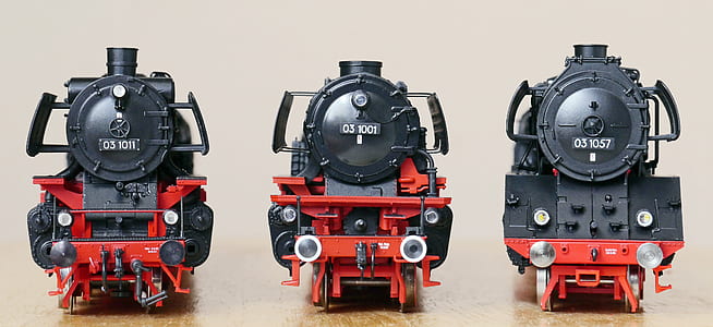 three black-and-red train models thumbnail