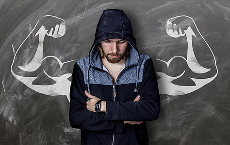 man wears black and grey zip-up jacket thumbnail