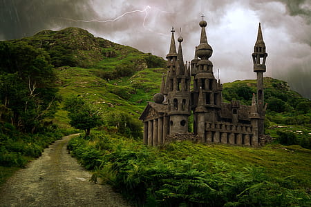 gray castle on green grass field under cloudy sky thumbnail