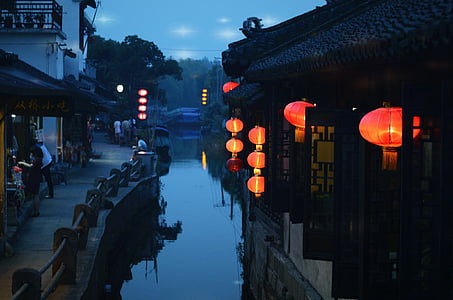 white and black buildings at nighttime thumbnail