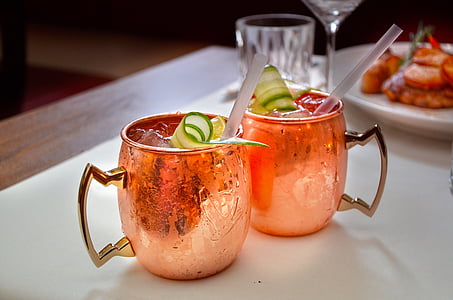 two orange glass mugs thumbnail