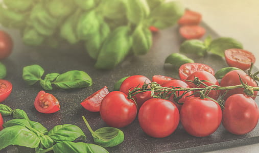 Photo of Tomatoes Near Green Leaves thumbnail