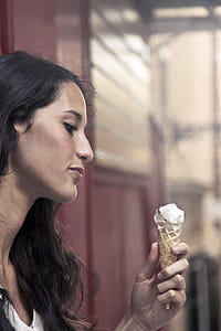 Photography of a Woman Holding Ice Cream thumbnail