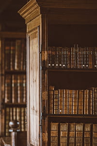 selective focus photography of brown wooden shelf thumbnail