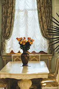 Table Beside Window Curtain thumbnail