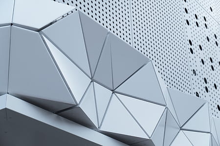 white steel building wall low-angle photography thumbnail