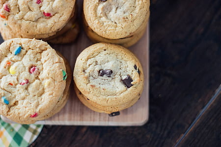 pile of cookies on beige wooden surface thumbnail