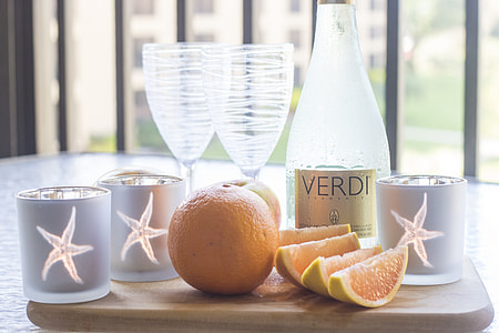 clear glass bottle and wineglasses thumbnail